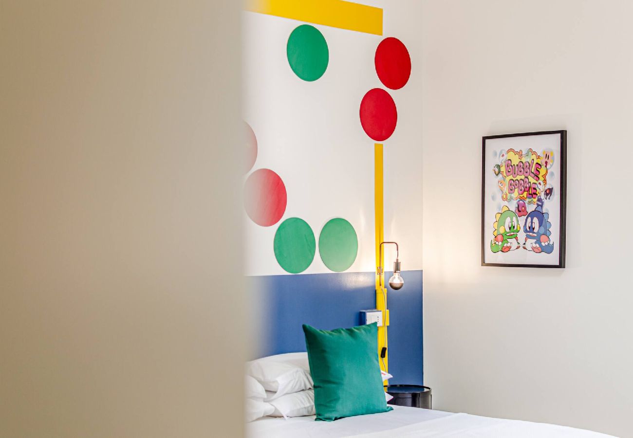 Rent by room in Livorno - Game Rooms - Puzzle Bobble Room